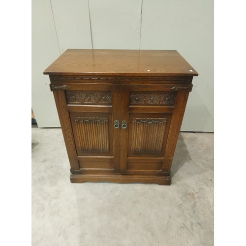 383 - A vintage entertainment cabinet repurposed to have four drawers and a hidden storage pocket on top.... 