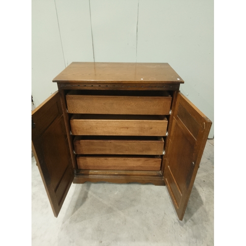 383 - A vintage entertainment cabinet repurposed to have four drawers and a hidden storage pocket on top.... 