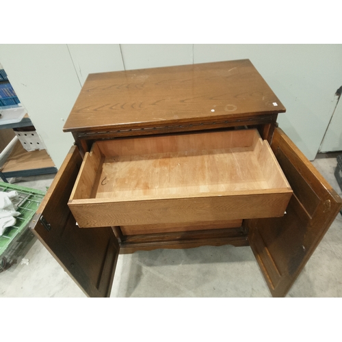 383 - A vintage entertainment cabinet repurposed to have four drawers and a hidden storage pocket on top.... 