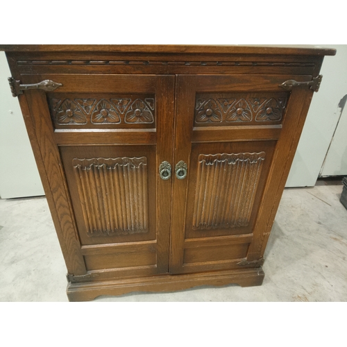 383 - A vintage entertainment cabinet repurposed to have four drawers and a hidden storage pocket on top.... 