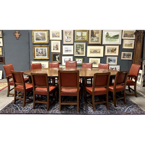 275A - Set of 12 mid century Oak chairs, leather upholstered and a matching boardroom table from the Univer... 