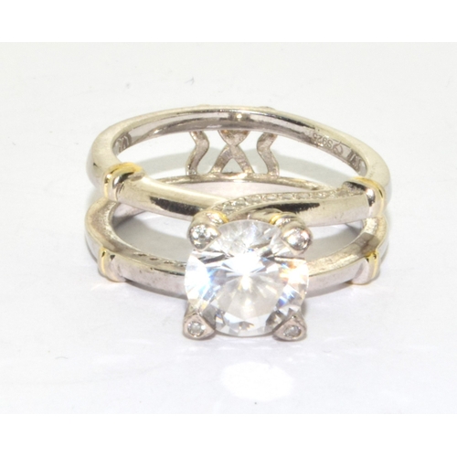 363 - 925 silver solitaire ring held in a double mount and claw setting size N