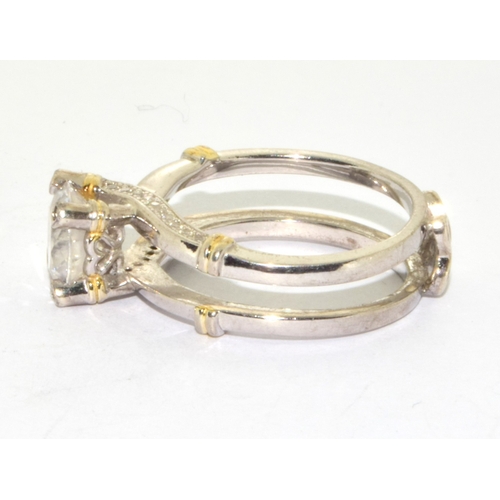 363 - 925 silver solitaire ring held in a double mount and claw setting size N