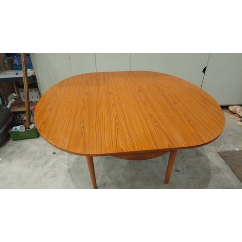 130 - Mid-Century Modern Shreiber dining table features an extendable function and sleek tapered legs. It ... 