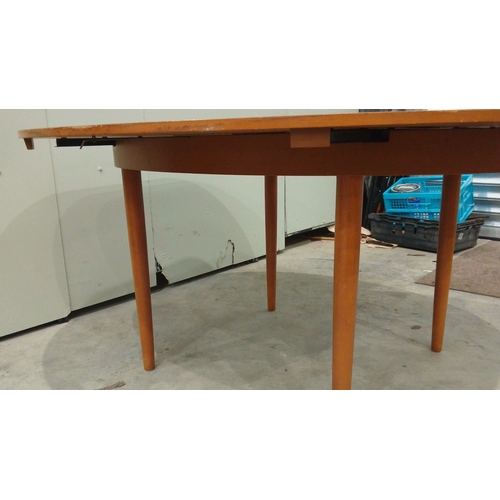 130 - Mid-Century Modern Shreiber dining table features an extendable function and sleek tapered legs. It ... 