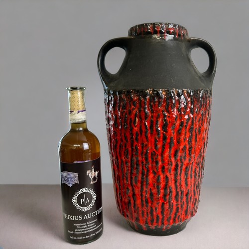 78 - A large retro West German Fat-lava pottery vase.By Carstens-Tönnieshof.Red & black ground, with ... 