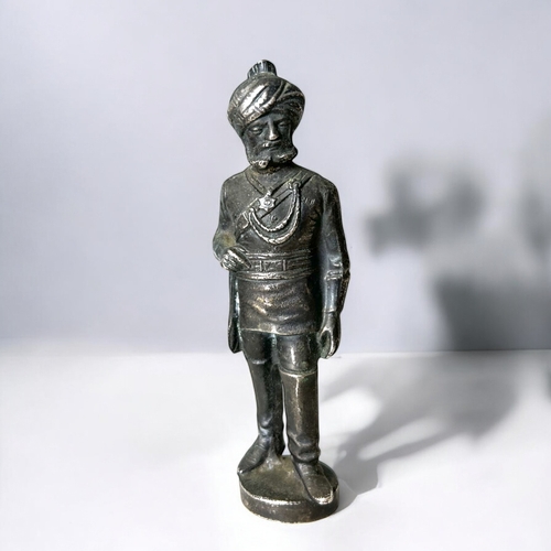 172 - A French silvered metal 'Sailor' figure. Together with a silvered Anglo-Indian Sikh officer. Sailor ... 