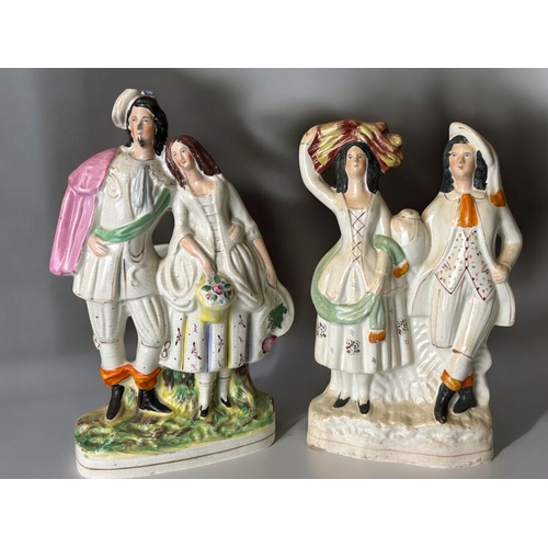 136 - A collection of three large 19th century Staffordshire figures and spill vase.Tallest - 35cm