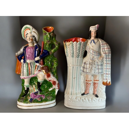 147 - A collection of four large Staffordshire figures.19th Century.Largest - 36cm tall