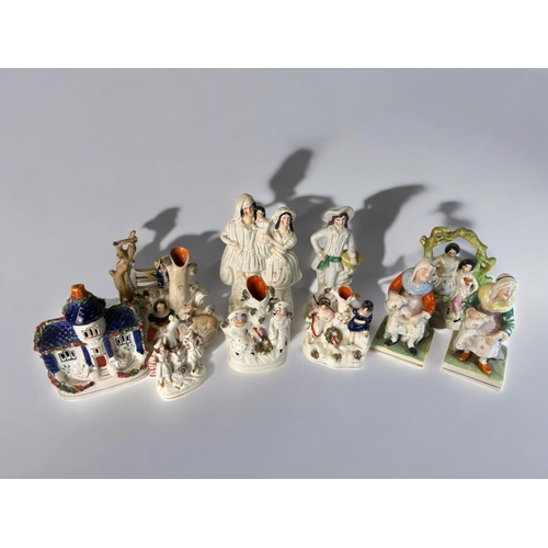 146 - A collection of Eleven 19th century Staffordshire figures.