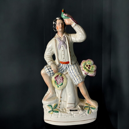 148 - Two large Victorian Staffordshire figures.Depicting Sailor and Fish seller. Tallest - 35cm... 