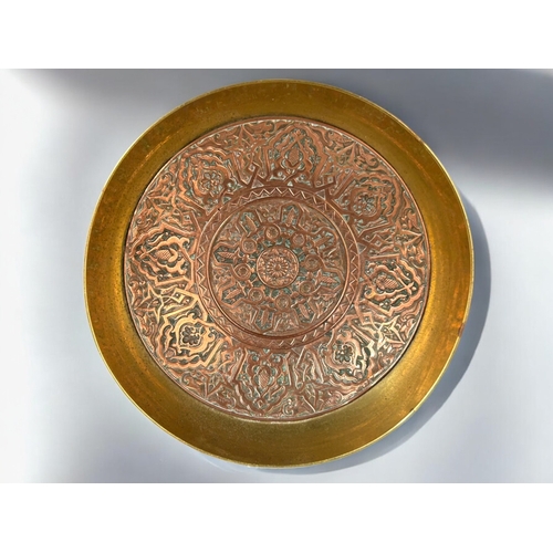 162 - A French Copper & brass pedestal Tazza. Decorated in Islamic style. Marked 'A. Paris' to base.