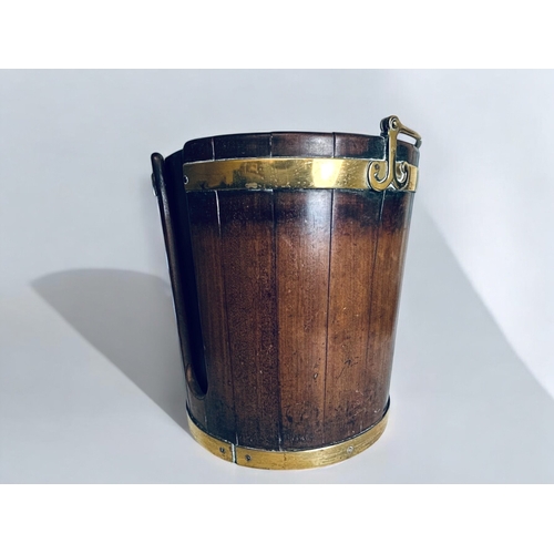 186 - A George III brass bound mahogany Plate bucket. Circa 1800. Stylised brass handle. With tole liner. ... 