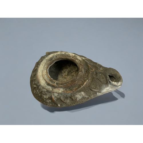 366 - Two Byzantine pottery oil lamps. 7-8th century A.D. 10 x 5 cm & 10.5 x 4cm   From the Pescod col... 