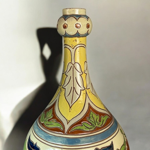 437 - A Salopian ware pottery 'Rhodian' vase. Late 19th century. Garlic shape, with Iznik style coloured s... 