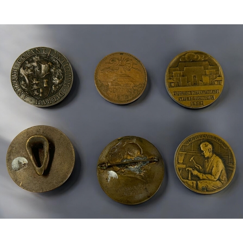 491 - A collection of six interesting bronze medals & coins.