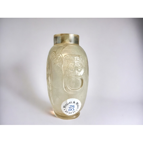 60G - A Chinese carved Rock crystal snuff bottle. Qing dynasty, 19th century. Skilfully carved roundels on... 