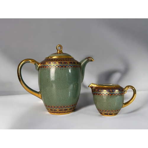 9 - A Thai Benjarong Celadon ground and enamelled painted Teapot and milk jug.20th century. Unmarked. He... 