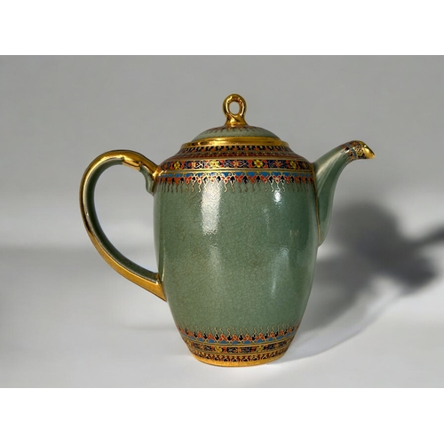 9 - A Thai Benjarong Celadon ground and enamelled painted Teapot and milk jug.20th century. Unmarked. He... 