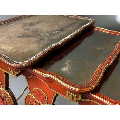 14 - A Chinese carved wood and Gesso nest of tables.Republic period, Circa 1920.Carved scenes in cinnabar... 