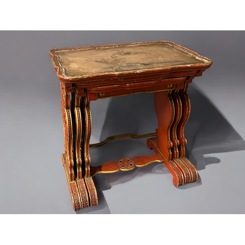 14 - A Chinese carved wood and Gesso nest of tables.Republic period, Circa 1920.Carved scenes in cinnabar... 
