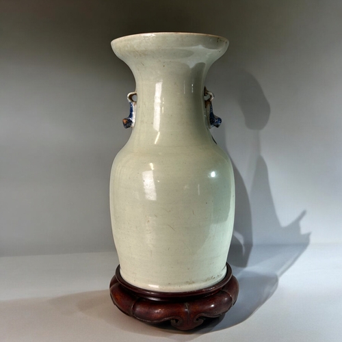 2 - A Chinese Celadon porcelain vase.Qing dynasty, 19th century.Twin Fo Dog handles, with blue & whi... 