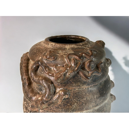 20 - A Chinese stoneware Yuan style brown glazed vase.Probably Qing dynasty.Ribbed body with relief Drago... 