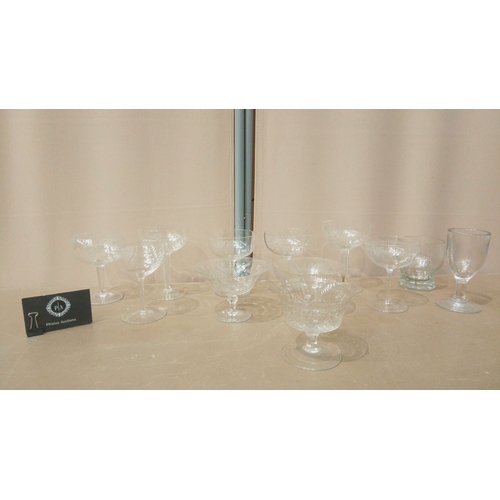 11 - Mixed set of 12 vintage etched glassware, featuring coupe and goblet styles. Timeless design with in... 