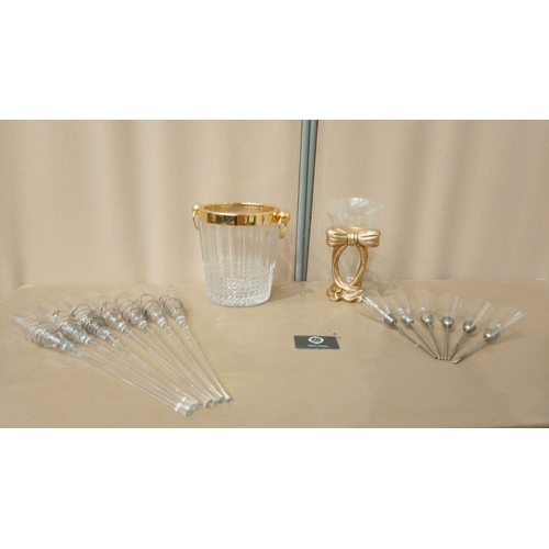 16 - Glass entertaining set, featuring a gold-rimmed ice bucket, gold-accented vase, and cocktail stirrer... 