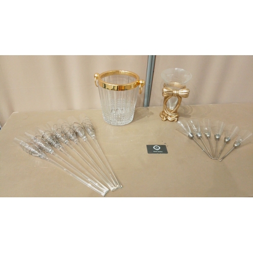 16 - Glass entertaining set, featuring a gold-rimmed ice bucket, gold-accented vase, and cocktail stirrer... 