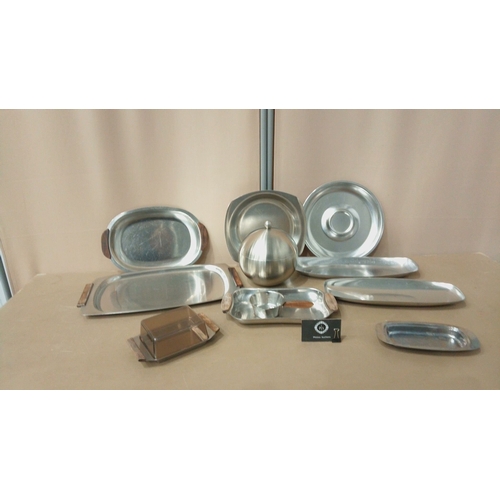 20 - Mid-century Modern Danish stainless steel tableware set by Hary Brescia, featuring sleek design with... 