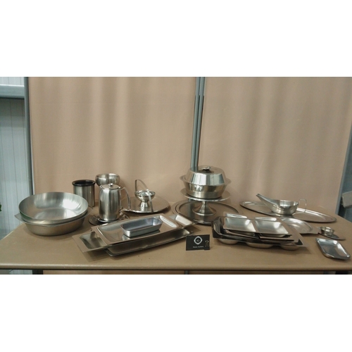 19 - Stellar stainless steel dining set, featuring classic mid-century modern design. Includes serveware ... 