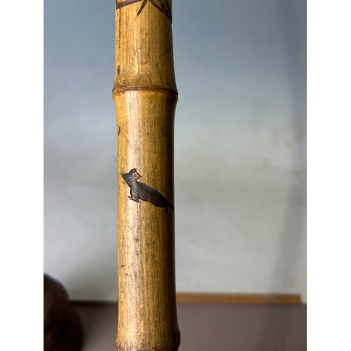 15 - A Japanese carved Bamboo walking stick.Meiji period, C 1900.Depicting Hotei on his sack, Rats and la... 