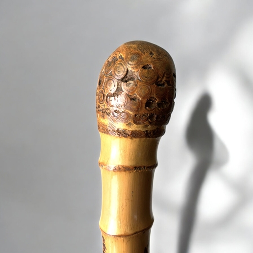 15 - A Japanese carved Bamboo walking stick.Meiji period, C 1900.Depicting Hotei on his sack, Rats and la... 