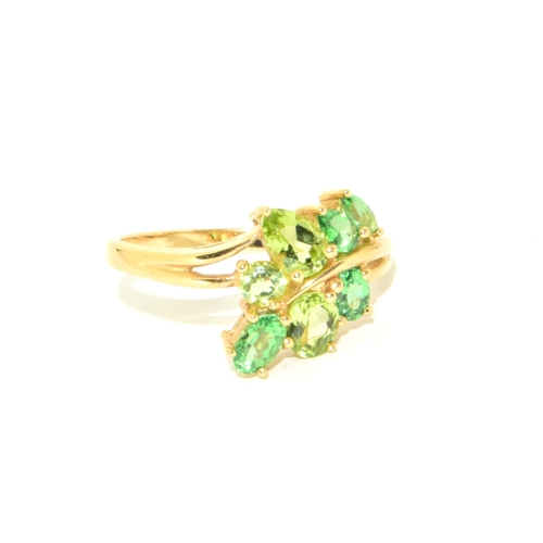 41 - 9ct gold ladies peridot and gem stone leaf design statement ring size S