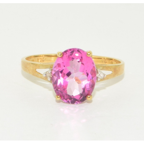 51 - 9ct gold ladies Pink Tourmaline ring with Diamond set shoulder in an open work setting size P