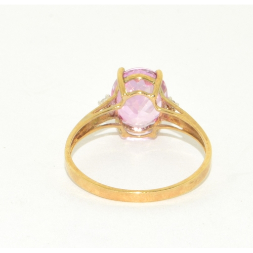 51 - 9ct gold ladies Pink Tourmaline ring with Diamond set shoulder in an open work setting size P