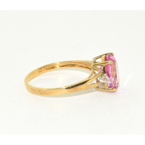 51 - 9ct gold ladies Pink Tourmaline ring with Diamond set shoulder in an open work setting size P