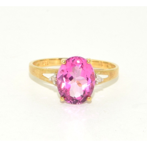 51 - 9ct gold ladies Pink Tourmaline ring with Diamond set shoulder in an open work setting size P