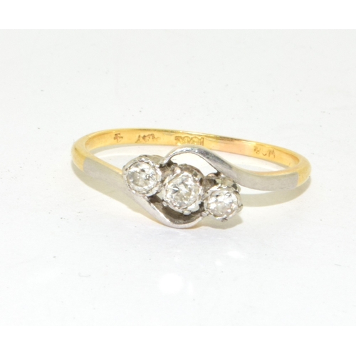 26 - 18ct gold ladies triple Diamond ring in a twist setting of 0.25ct size P