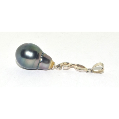 45 - Tahitian black pearl pendant held in a 925 silver TGGC setting 