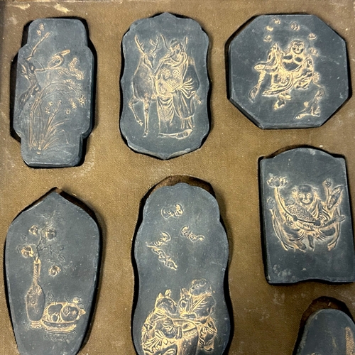16 - A boxed set of nine Chinese Ink stones / cakes.Republic period.Maimo, depicting gilded Auspicious pi... 