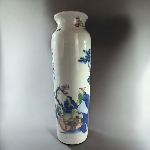 21 - A Chinese Wucai glazed 'Narrative' sleeve vase.Qing dynasty.Depicting figures in a forest setting.In... 