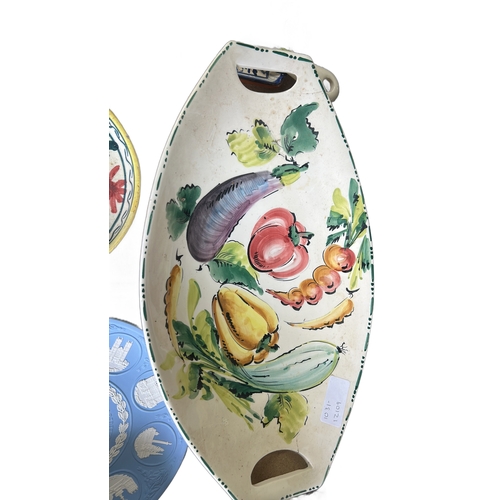 62 - Italian ceramic serving dishes feature hand-painted fruit and floral motifs. Including Wedgwood Blue