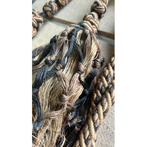 64 - Antique  braided tassels, multi-coloured with intricate knot details.