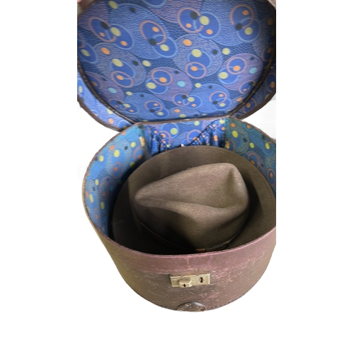 65 - Vintage leather hatbox with lock, featuring vibrant interior lining. Plus two American made Hats