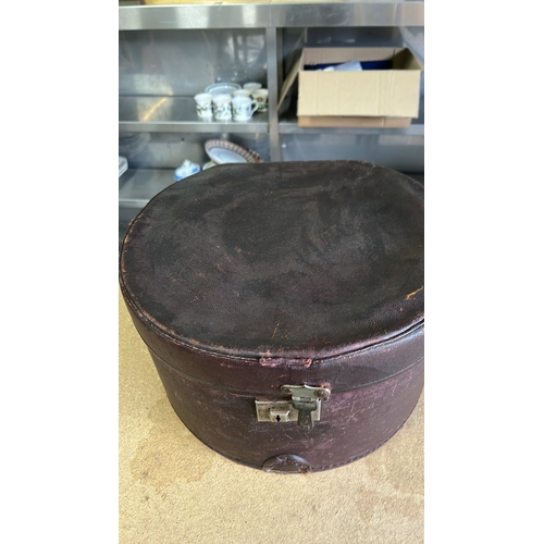 65 - Vintage leather hatbox with lock, featuring vibrant interior lining. Plus two American made Hats