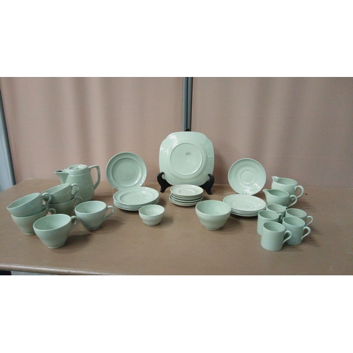 55 - Vintage Spode porcelain tea and dinner set includes cups, saucers, plates, teapot, and creamers. The... 