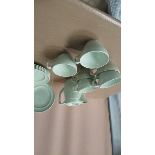 55 - Vintage Spode porcelain tea and dinner set includes cups, saucers, plates, teapot, and creamers. The... 