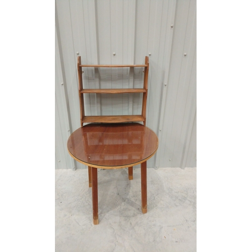 46 - Mid-century wooden circular side table with a polished veneer top and sturdy tapered legs. Structura... 